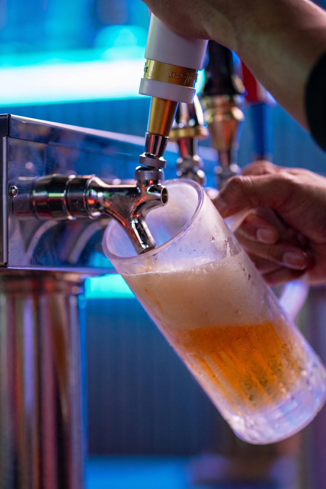 A frosted mug being filled at the SKYBOX tap